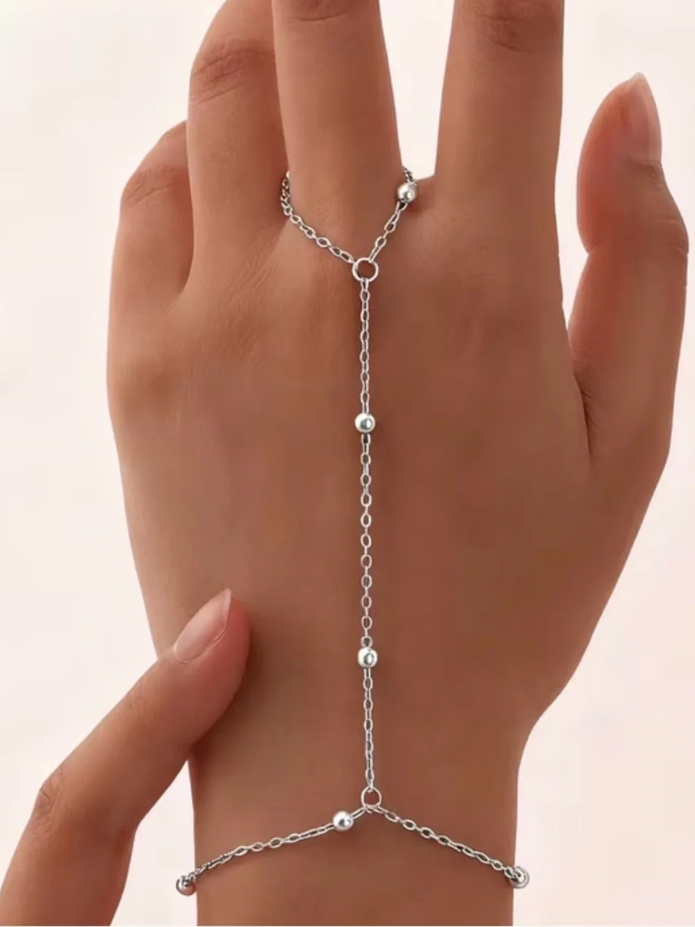 Delicate Silver-Tone Hand Chain Bracelet with Bead Accents